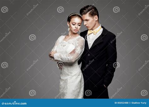 Groom in Yellow Bow-tie with Bride, Studio Stock Photo - Image of married, bridal: 85052488