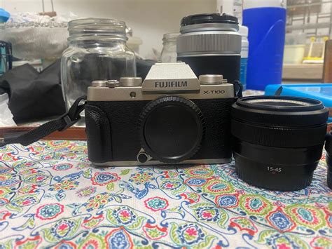 FUJIFILM XT100 WITH THREE LENSES, Photography, Cameras on Carousell