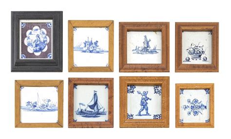Lot - EIGHT FRAMED DELFT POTTERY TILES Each with blue and white figural, fruit, windmill, boat ...