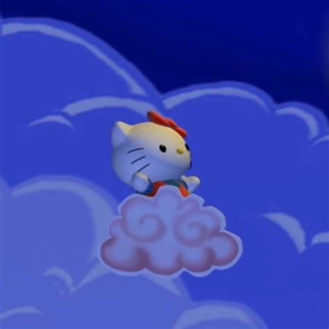 a hello kitty sitting on top of a cloud