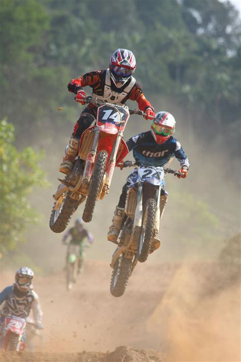 Two People Riding on Dirt Bike · Free Stock Photo