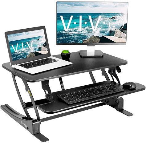 Height adjustable standing desk converter - sworldras