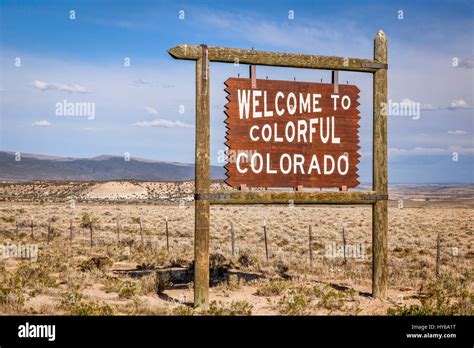 welcome to Colorado roadside wooden sign at a border with Utah in ...