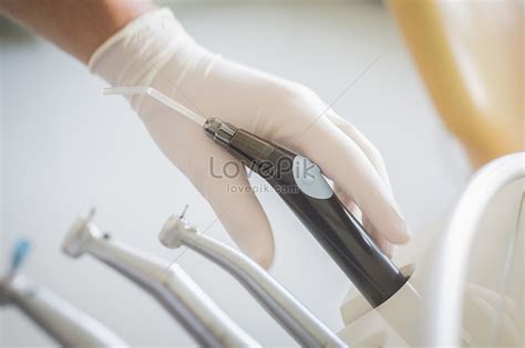 Close Up Of Dentist Reaching For Dental Tools Picture And HD Photos ...