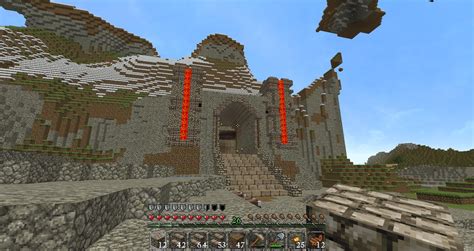 I feel like my "grand entrance" to our SMP mountain base/castle isn't "grand" enough. Any ideas ...