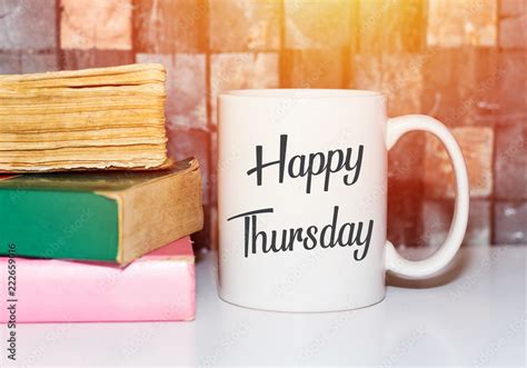 Happy thursday word on white morning coffee cup and books Stock Photo | Adobe Stock