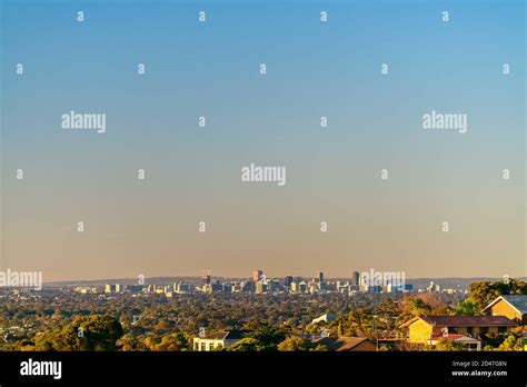 Adelaide city skyline viewed from the hills at sunset, South Australia ...