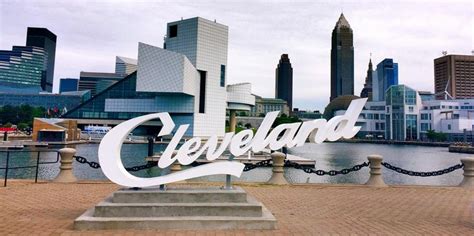 Cleveland Sign w Downtown skyline | Hotel packages, Historical place, Drive across america