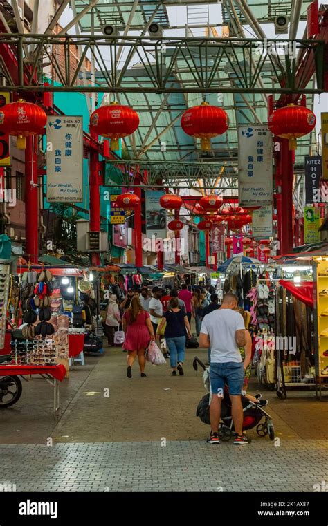 Shopping at Petaling Street night market, Chinatown, Kuala Lumpur, Malaysia Stock Photo - Alamy