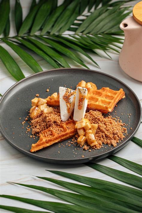 Waffles with Ice Cream and Babanas in Caramel Stock Photo - Image of ...