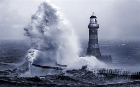 Majestic Lighthouse: HD Wallpaper of Nature's Fury