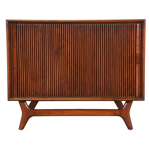 Mid-Century Tambour Door Cabinet with Sculptural Base at 1stdibs