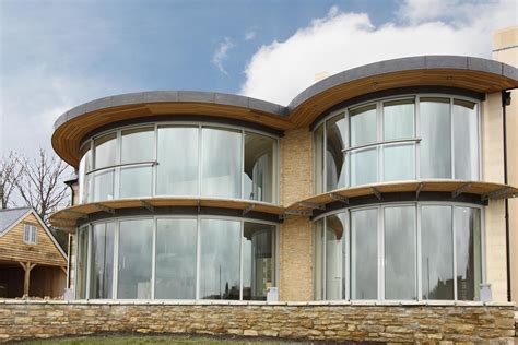 Stunning Curved Glass Doors for Private Patios and Public Buildings ...