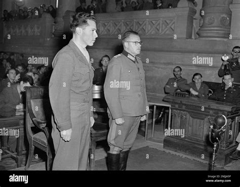 German Gen. Anton Dostler, right, and his GI interpreter Sgt. Albert Hirschman, stand before the ...