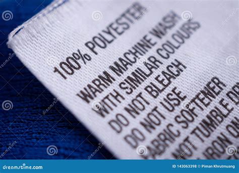 Polyester Clothing Label with Laundry Care Instructions Tag Stock Photo - Image of cotton, blue ...