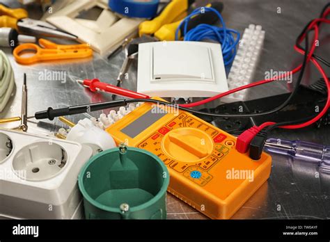 Electrician tools on metal background, closeup Stock Photo - Alamy