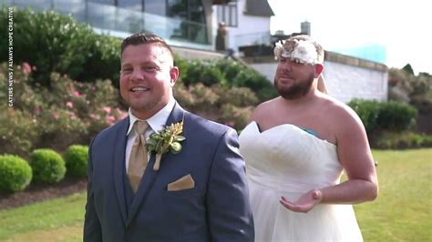 Best man pranks groom by wearing wedding dress for first look