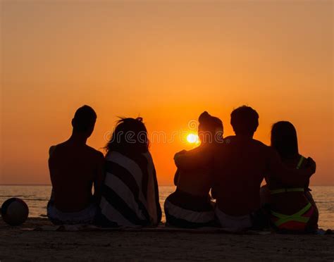 Silhouettes of a People Sitting on a Beach Stock Image - Image of rest ...