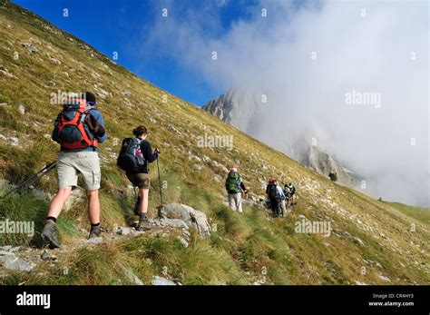 Hiking, trekking group on an alpine trail in Mercantour National Park ...