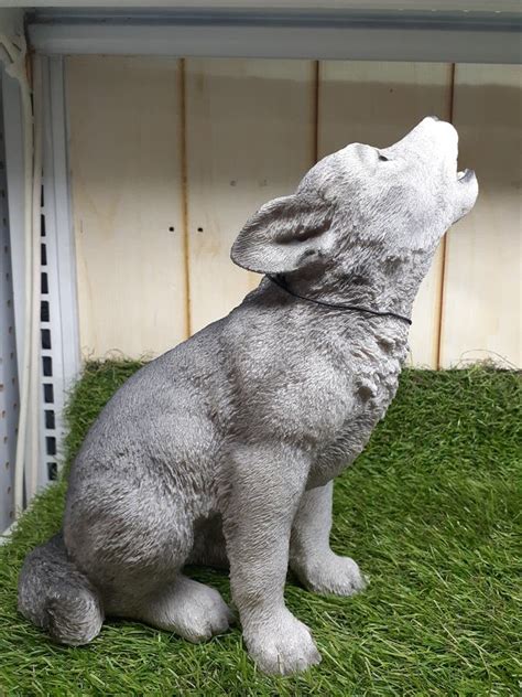 Statuary baby wolf white stock image. Image of indoor - 205768103