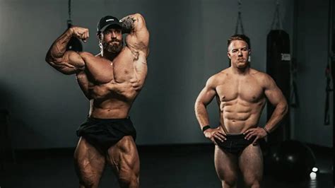 Download Chris Bumstead With Fellow Bodybuilder Wallpaper | Wallpapers.com