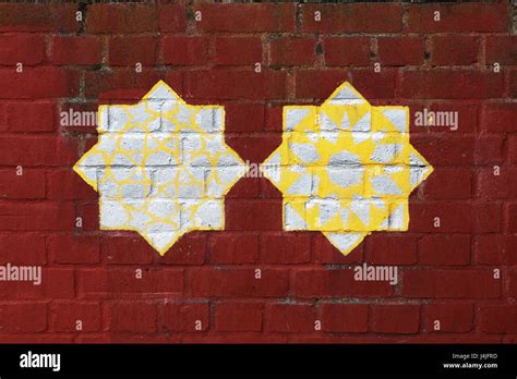 Red brick wall with graffiti pattern Stock Photo - Alamy