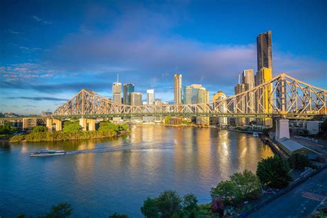 Download Stunning View Of Brisbane City Skyline At Sunset Wallpaper | Wallpapers.com