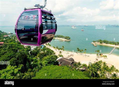 Singapore cable car in Sentosa island with aerial view of Sentosa ...