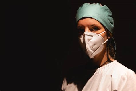 70+ Nurse In Isolation Gown Stock Photos, Pictures & Royalty-Free ...