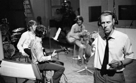 a moral to this song — The Beatles with George Martin rehearsing for the...