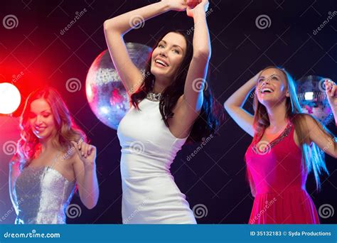 Three Smiling Women Dancing In The Club Stock Image - Image: 35132183