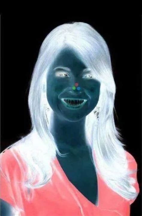 Stare at the red dot on the woman's nose for 30 seconds and then close ...