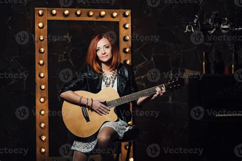 young girl with red hair with an acoustic guitar 2377152 Stock Photo at ...