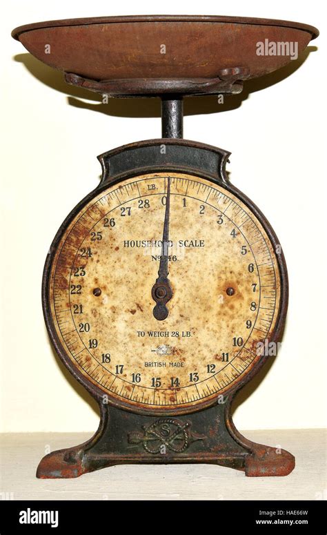 Weighing scale antique hi-res stock photography and images - Alamy