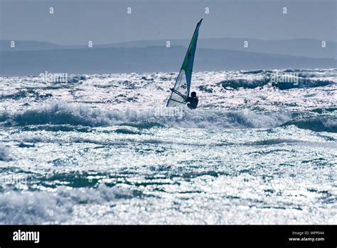 Windsurfing on West Wittering beach, West Sussex Stock Photo - Alamy