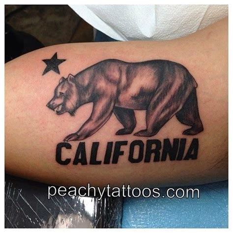 a bear with the word california written on it's side and stars in the ...