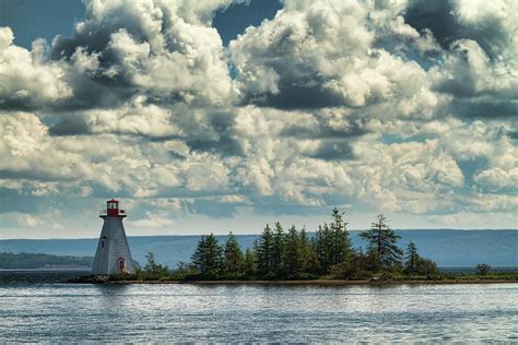 The Lighthouse At Baddeck, Nova Scotia by Anne Mckinnell