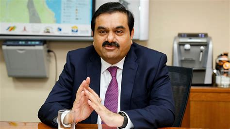 Adani group hits 100 bn m-cap, a first for a first generation Indian ...