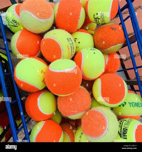 Soft Orange Junior Tennis Balls Stock Photo - Alamy