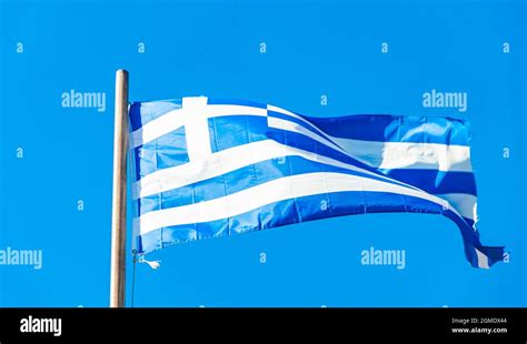 Greek blue and white flag with blue sky background on Rhodes in Greece ...