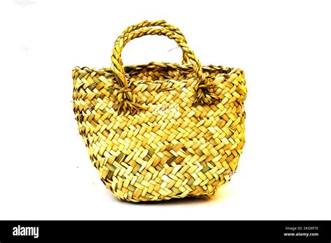 woven straw basket isolated on white background Stock Photo - Alamy