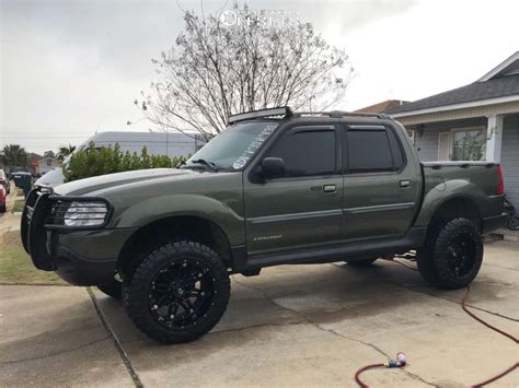 Black Ford Explorer Sport Trac Lifted