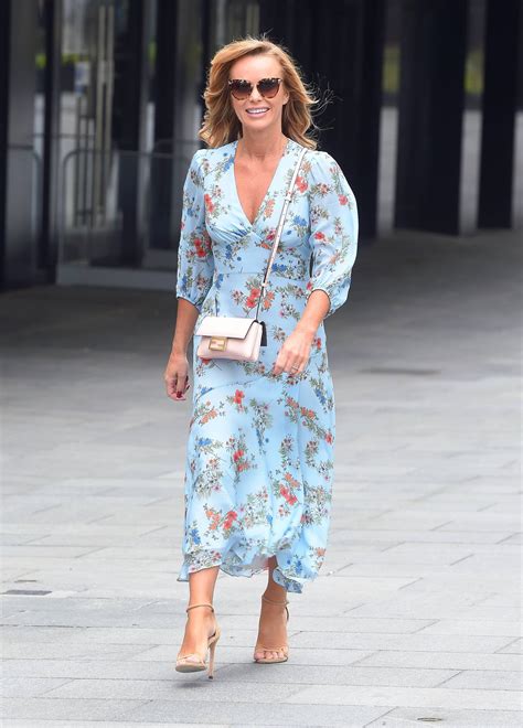 Amanda Holden - Wearing a flower print dress while leaving the Global ...