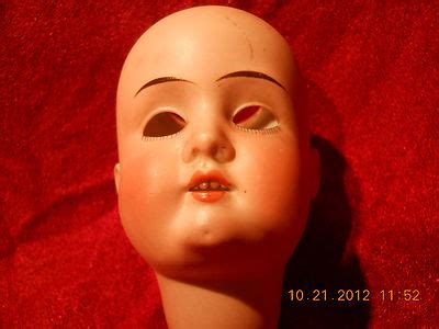 antique doll head -- Antique Price Guide Details Page