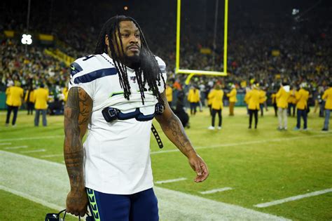 Marshawn Lynch, Aaron Rodgers exchange jerseys - Yahoo Sports