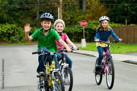 Children riding bikes outside Stock Photo | Adobe Stock