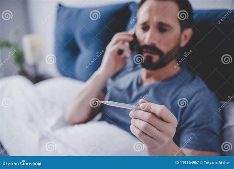 Sick Man Holding Thermometer Stock Image - Image of people, sick: 119164967