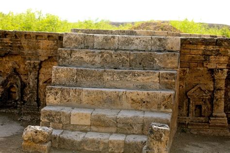 The ruins of Taxila contain buildings and Buddhist stupas located over a large area credits ...