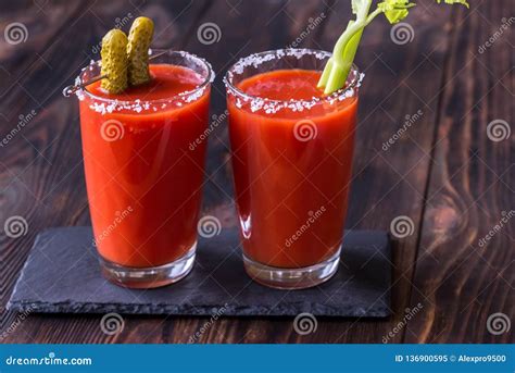 Two glasses of Bloody Mary stock image. Image of bloody - 136900595