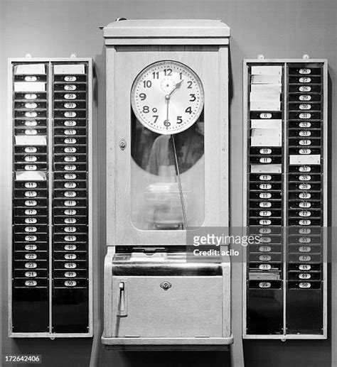 Time Punch Clock Photos and Premium High Res Pictures - Getty Images